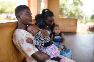 Mentor Mother with child in Uganda.