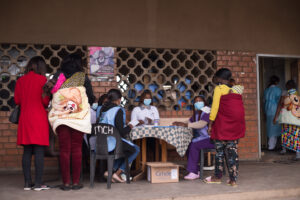 mothers2mothers Mentor Mothers and their clients outside Chipata Hospital in Zambia.