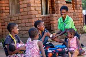 m2m Community Mentor Mother with clients in Malawi