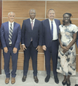 Members of m2m's leadership team meeting with the DRC Minister of Health.