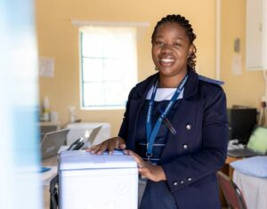 Maqenehelo smiling while at work in Lesotho
